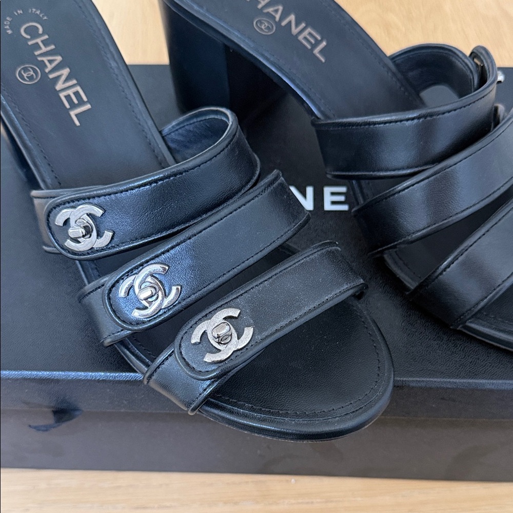 CHANEL Black Triple-Strap Leather Mules with Silver CC Logos